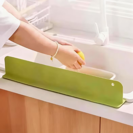 Sink splash guard installed on kitchen sink