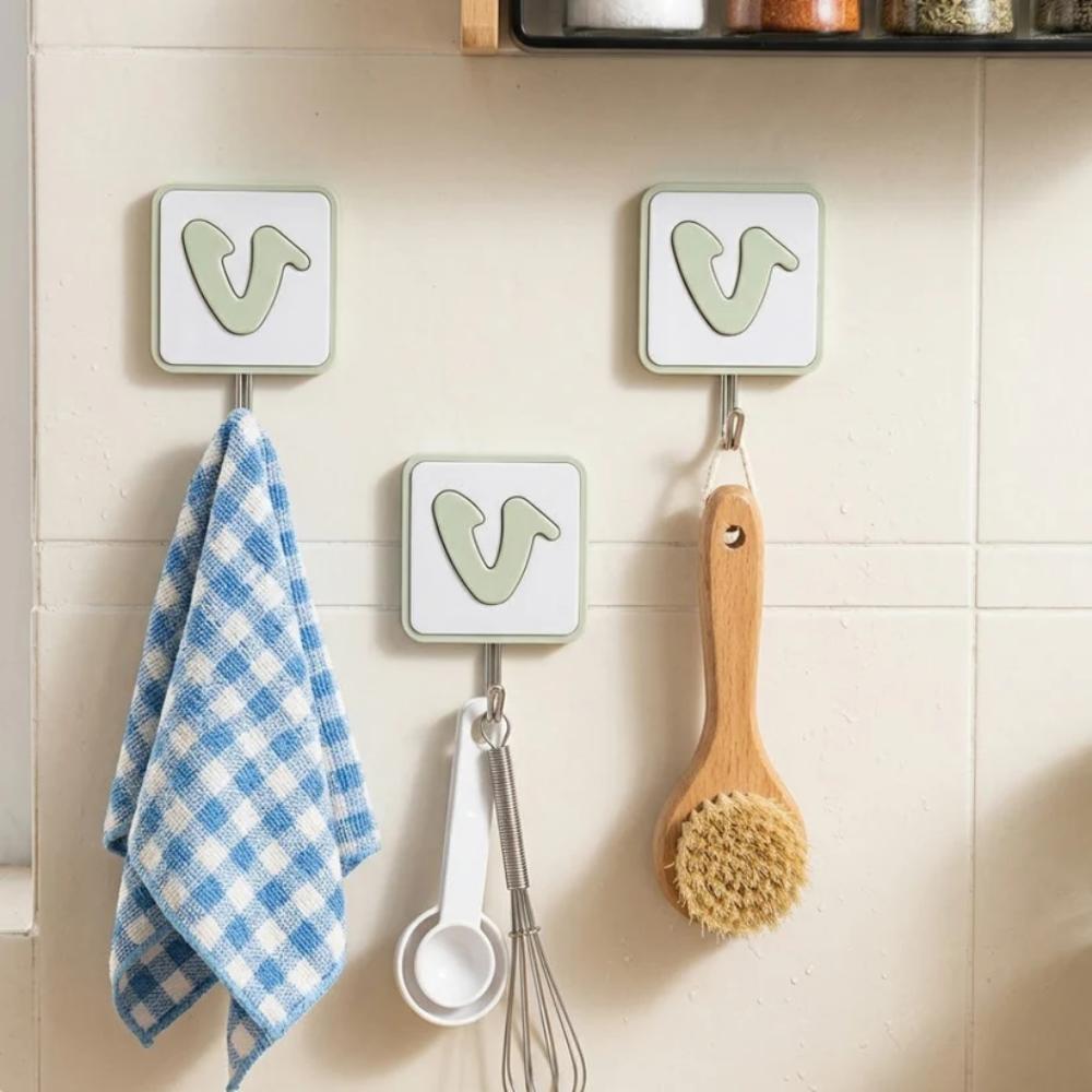 Self Adhesive V Shape Wall Hooks, strong grip hooks for bags, keys, and towels in Pakistan homes