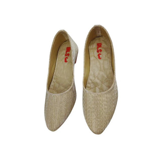 Beige slip-on flat shoes for women featuring a pointed toe, comfortable footbed, and durable sole for everyday comfort.