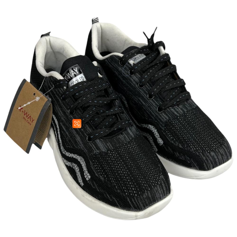 Black and white mesh sports shoes for men with breathable upper, lace-up closure, and lightweight cushioned sole.