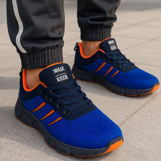 Men's blue athletic shoes featuring breathable mesh fabric, flexible outsole, and cushioned comfort for daily wear.