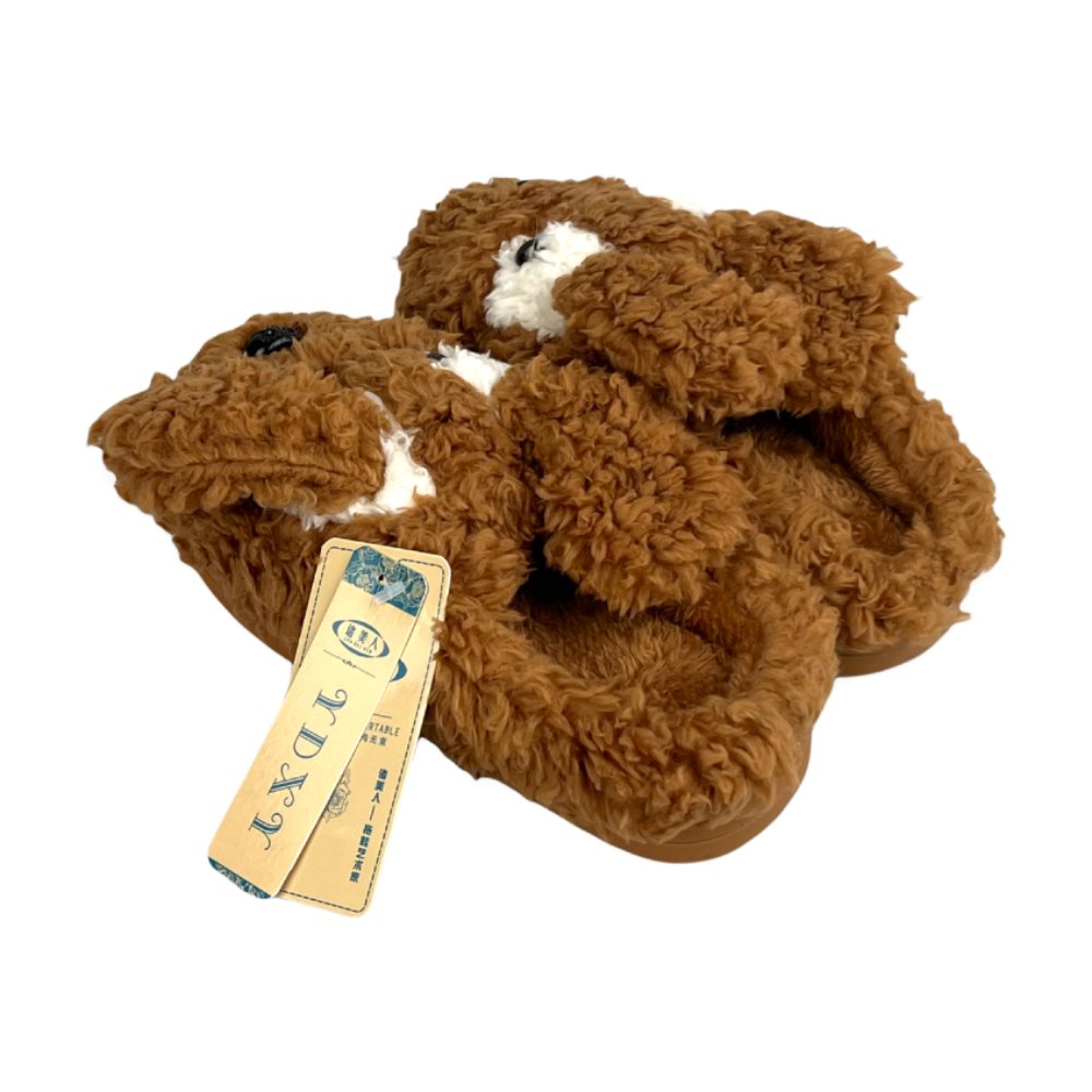 Cozy indoor bear slippers made with plush fabric, soft lining, and a supportive sole for relaxing around the house.