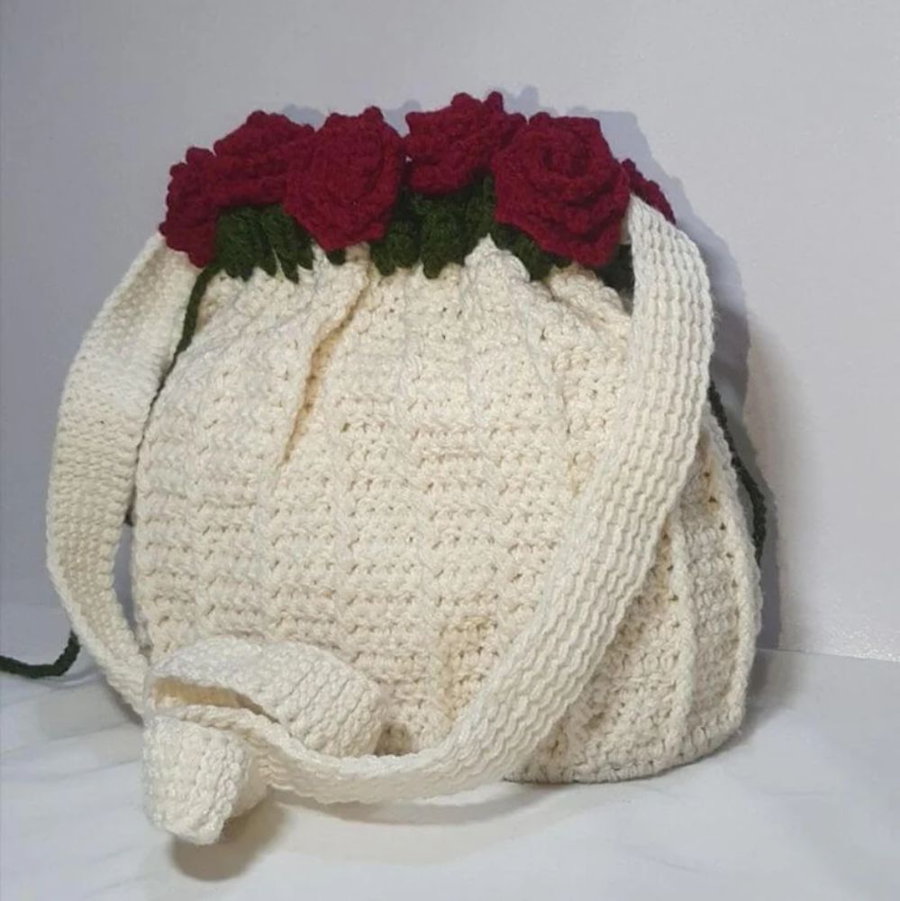Handmade Crochet Rose Bag for Girls, lightweight shoulder potli style bag for casual wear in Pakistan