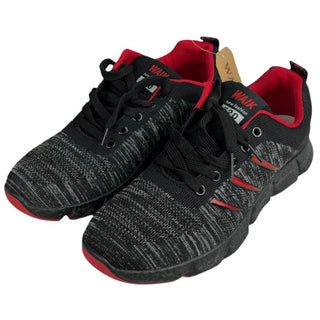 Black lace-up sports shoes for men designed with breathable mesh upper, flexible sole, and everyday comfort.