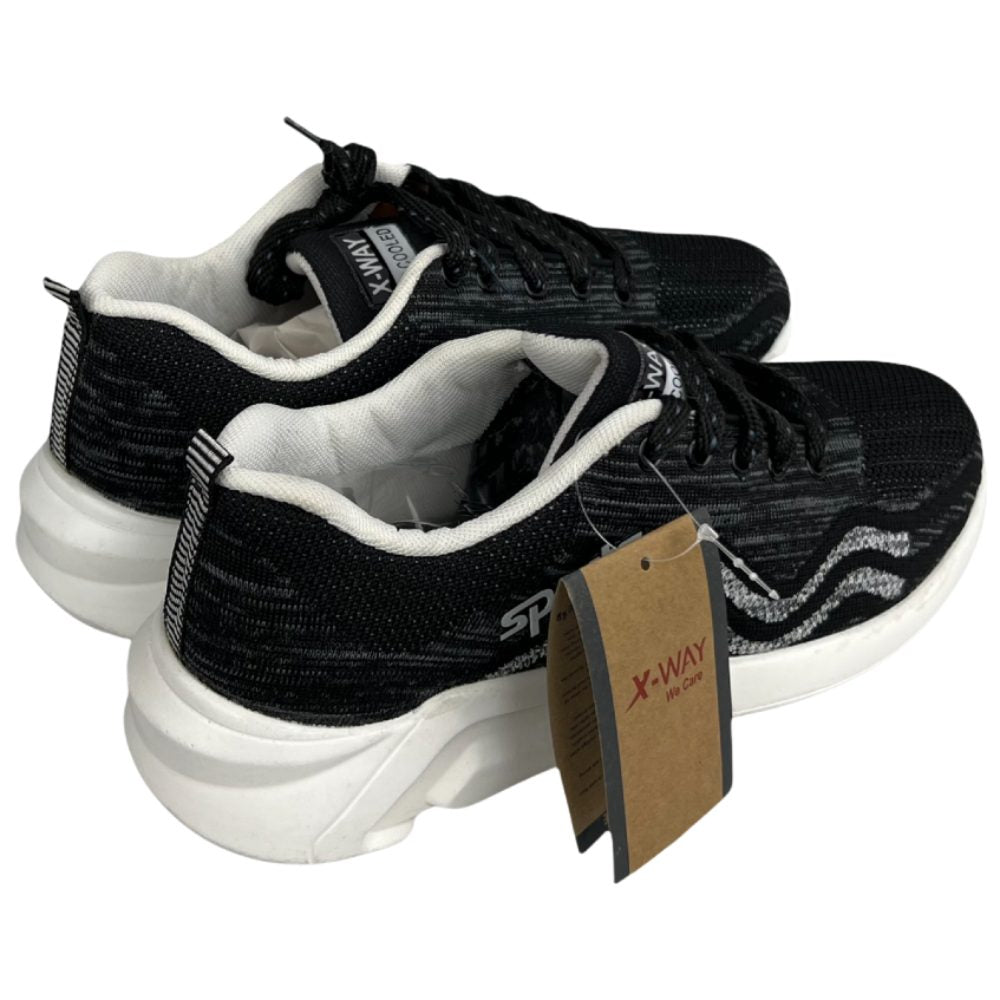 Black white casual athletic shoes for men with flexible sole, breathable mesh material, and cushioned everyday comfort.