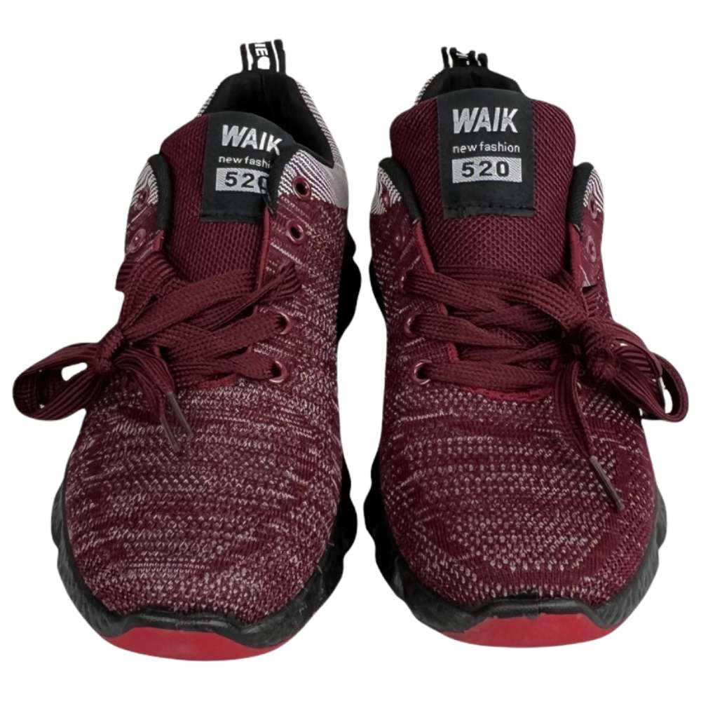 Men's red mesh athletic footwear with flexible outsole, secure lace-up fit, and breathable upper for everyday use.