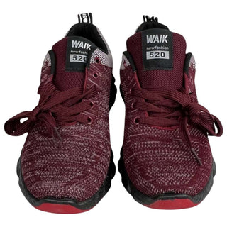 Men's red mesh athletic footwear with flexible outsole, secure lace-up fit, and breathable upper for everyday use.