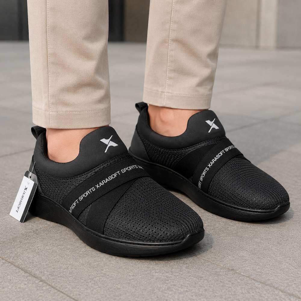 Comfortable grey slip-on shoes for men featuring lightweight construction, breathable fabric, and flexible outsole.