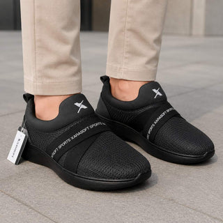 Comfortable grey slip-on shoes for men featuring lightweight construction, breathable fabric, and flexible outsole.